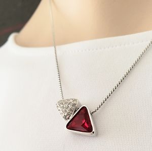 Authentic SWAROVSKI necklace and stud earrings